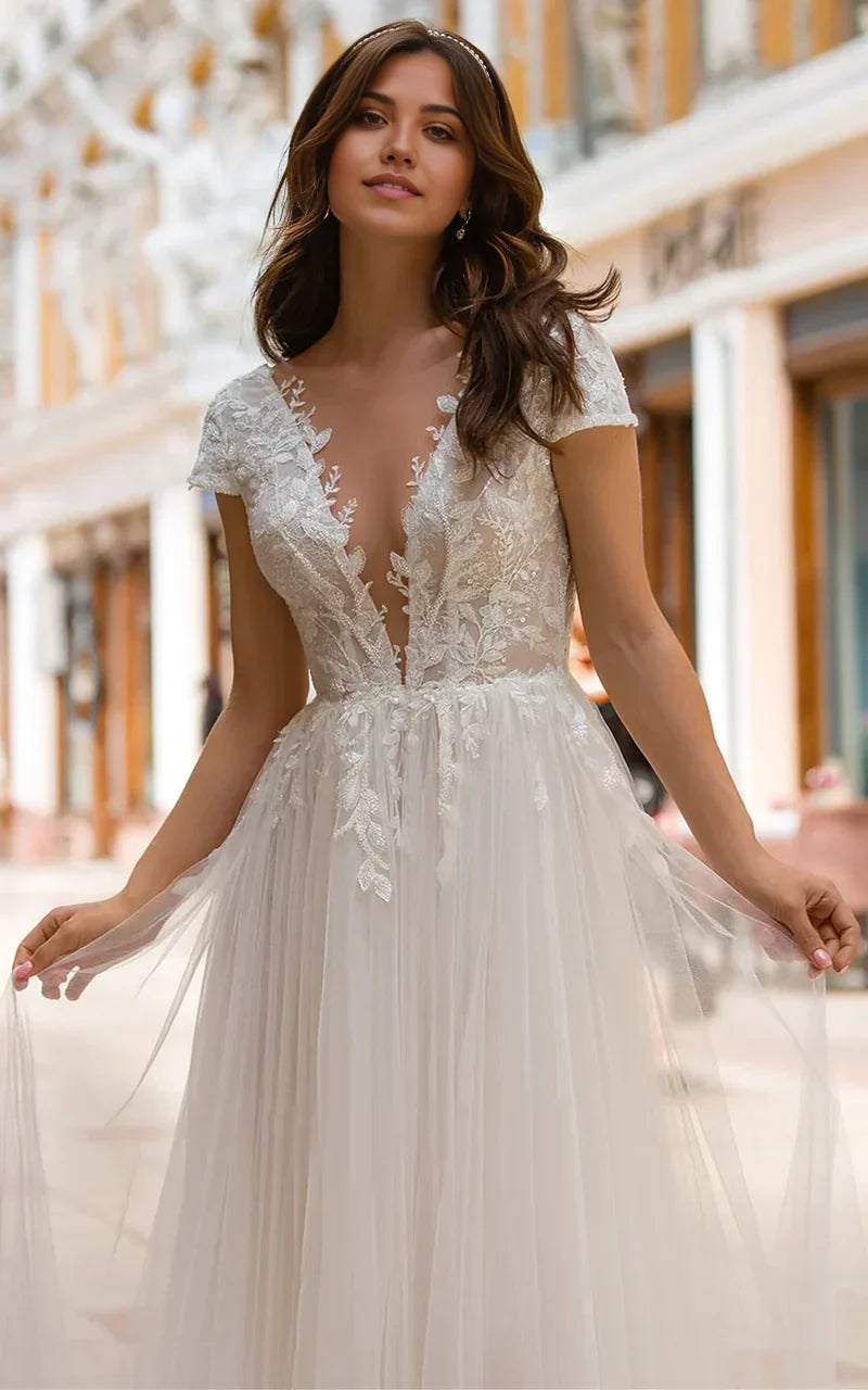 A Line Plunging Neckline Tulle Sweep Train Wedding Dress with Appliques