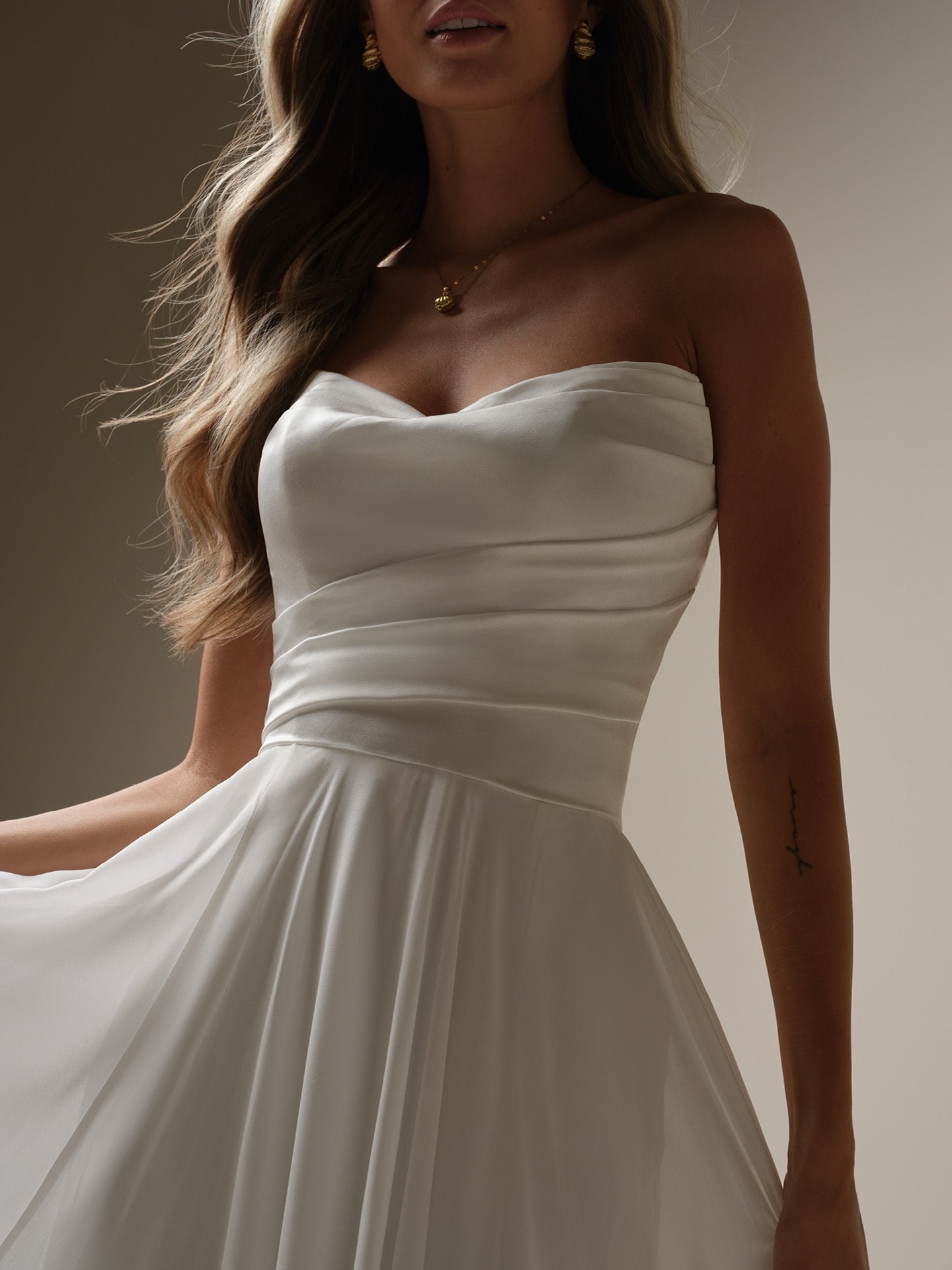 A-line chiffon hanging strapless and floor length wedding dress