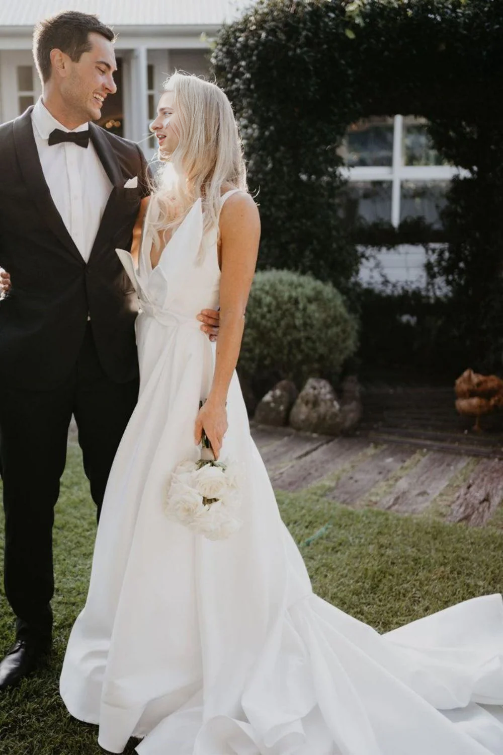 A Line Deep V Neck Slit Wedding Dress with Bowknot