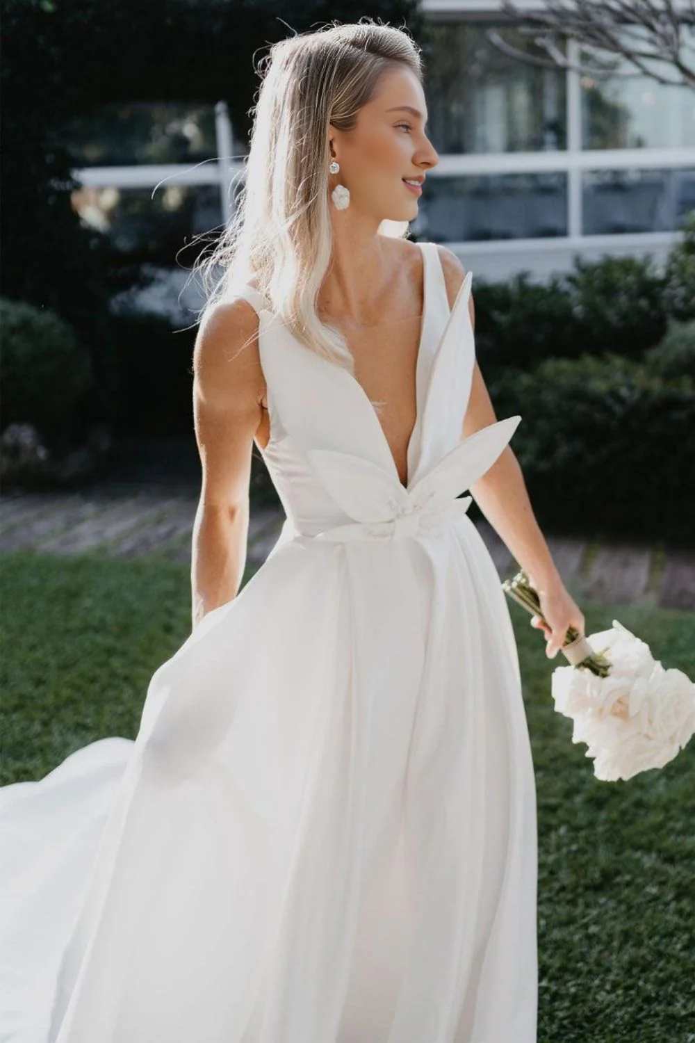 A Line Deep V Neck Slit Wedding Dress with Bowknot