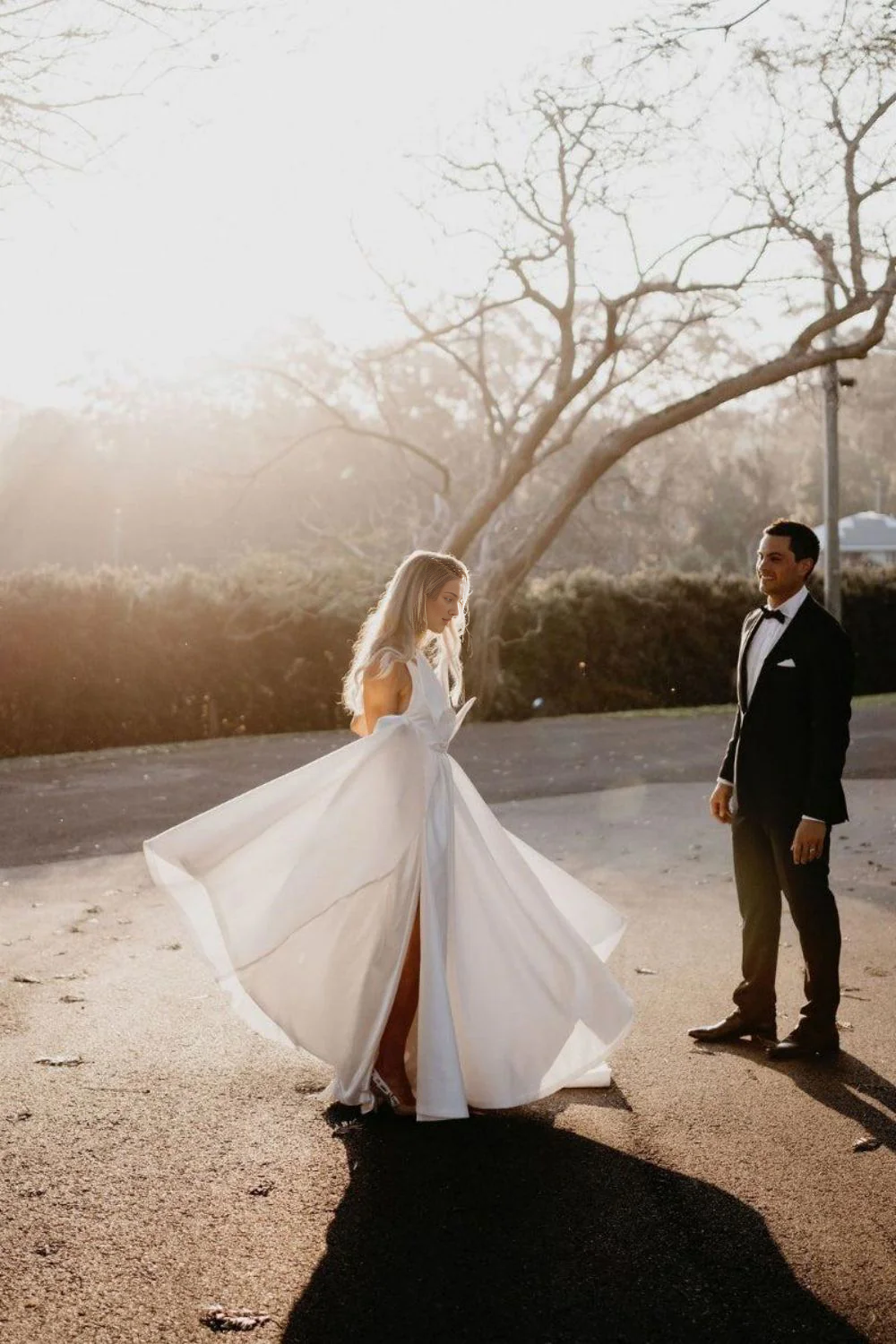 A Line Deep V Neck Slit Wedding Dress with Bowknot