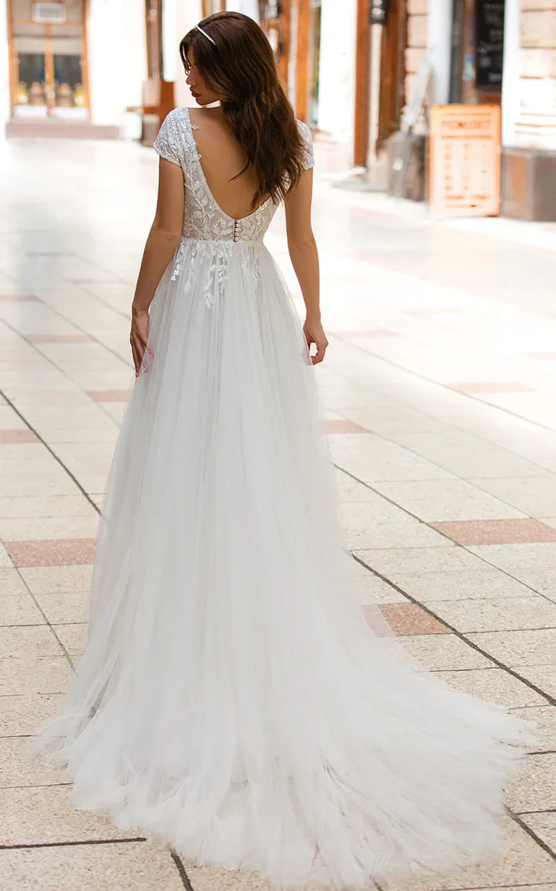 A Line Plunging Neckline Tulle Sweep Train Wedding Dress with Appliques