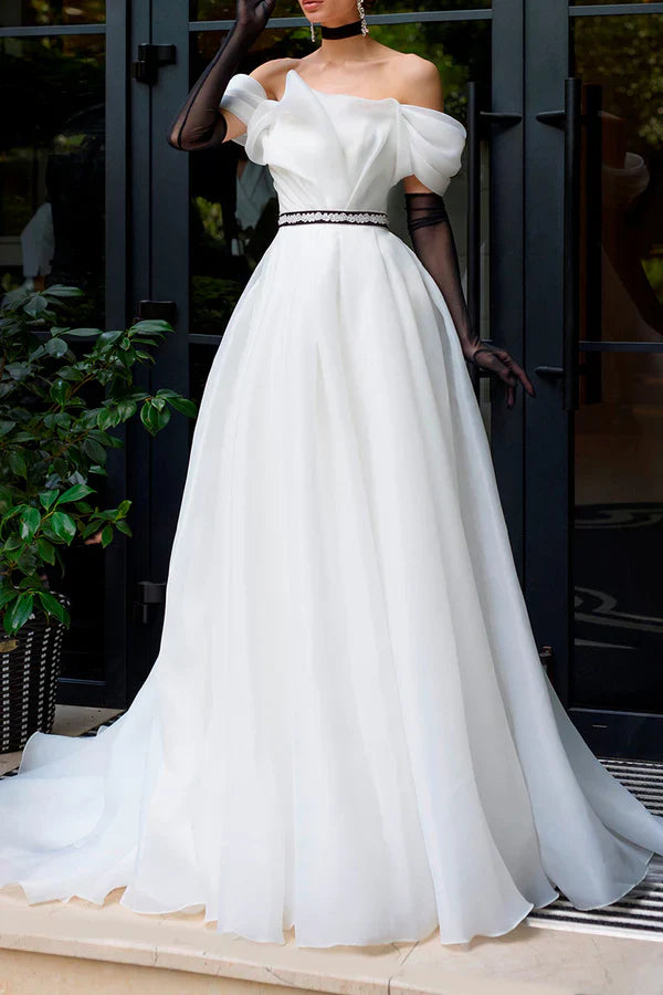 A Line strapless organza ivory rustic wedding dress paired with court train